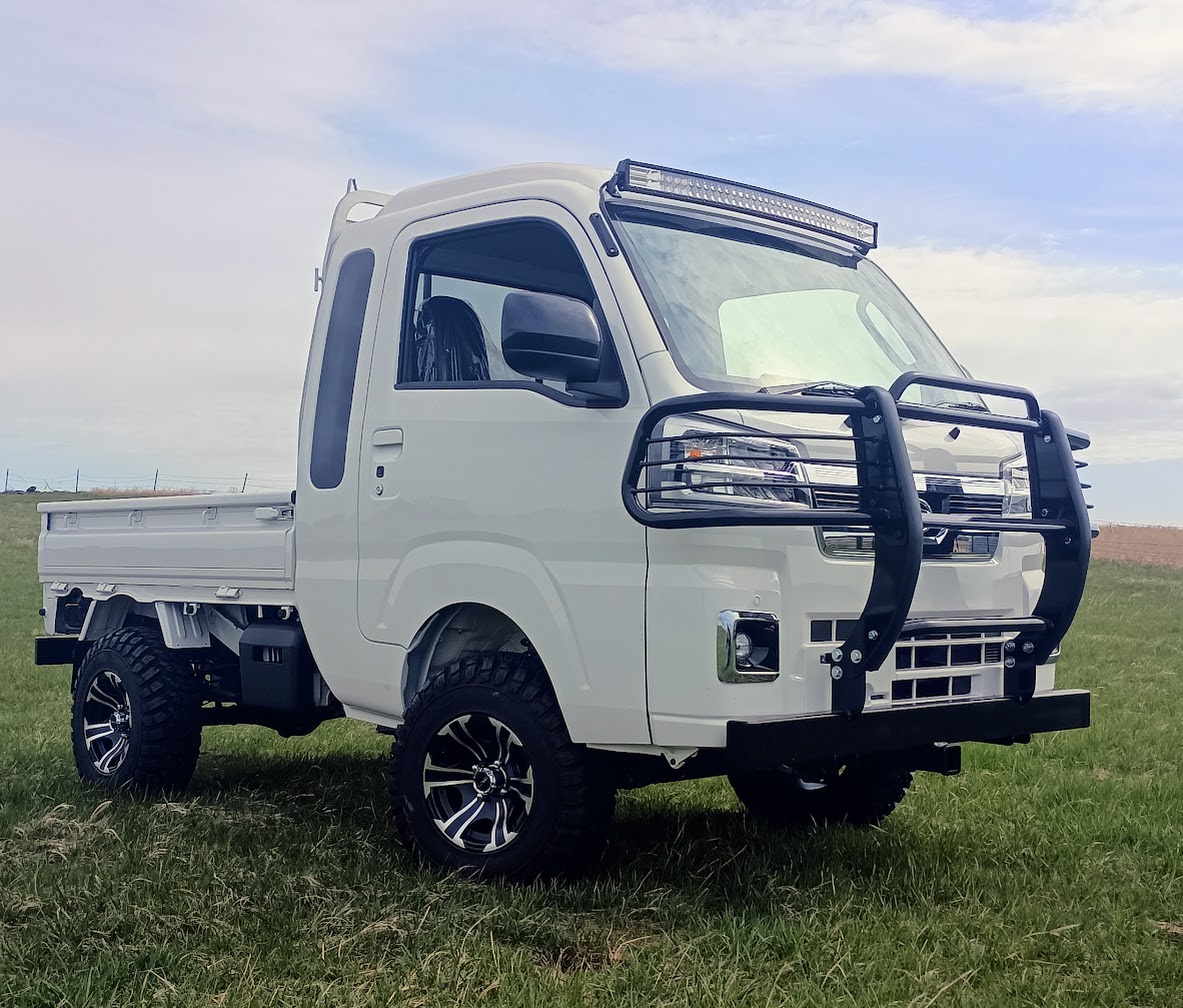 White Jumbo grille guard and lightbar